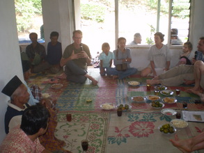 Greg speaks at Kunir village meeting
