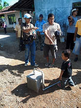 Agni and Paisan discuss the biogas project