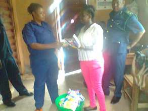 Makeni paralegal with prison officers
