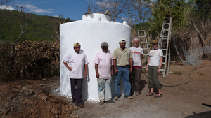 Volunteers and construction crew