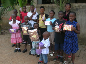 Children carrying their gifts