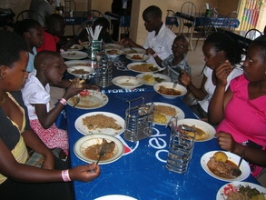 Children having a Christmas meal in a hotel