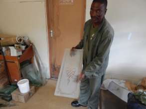 Mr. T working on a piece of glass