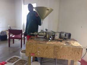 Thokozane with the oil press