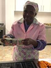 Nothando setting up for breakfast