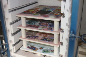 Kiln full of student projects for fusing