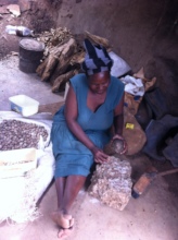 Florence cracking marula nuts the traditional way