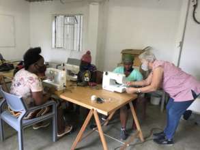 Maria, a volunteer trains on the electric machines