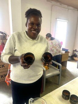 Preparing to fill jars with a new batch of cream