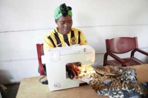 Nonhlanhla sewing!