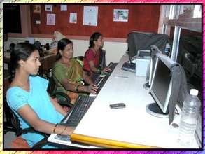 Women participating in computer class