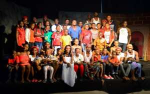 FLA Kids pose with actors of Ugonma
