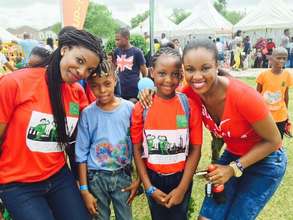 Sponsors pose with their children