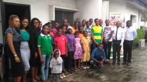 Damilola with more friends and more kids!