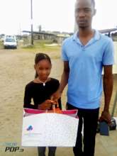 Precious collecting her xmas gift from Bloom Story