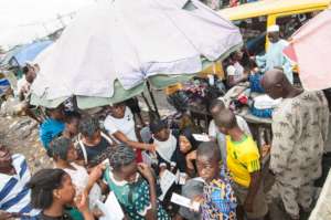 Distributing Food Stamps at Ajegunle