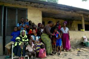 Ebola Survivor Dr. Gassama and community, Guinea