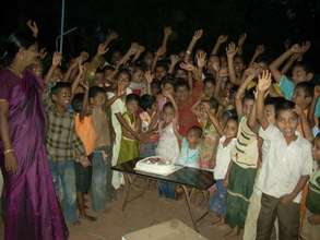 children with birth day cake