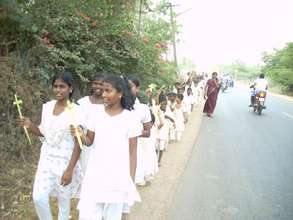 children going outside on the road