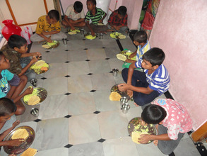 orphan boy children having lunch in joyhome