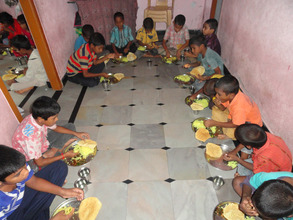 orphan children home giving nutritious lunch