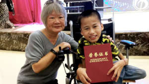 Student and teacher share a moment.
