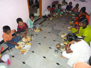 dinner having by the orphan children