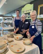 Volunteers in the Blue Cross secondhand shops