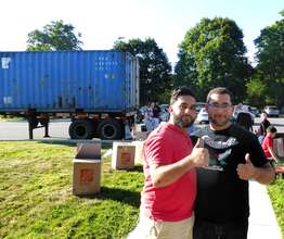 Adam and Ahmed load the container!