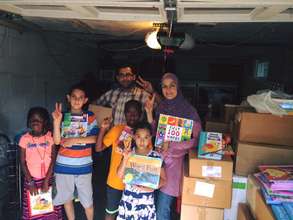 Our volunteers with hundreds of donated books!