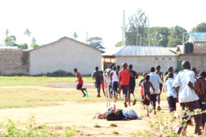Dula leading the warm up with 50 children!