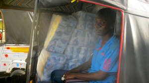 Street Worker Janet in a tuk tuk full of supplies!