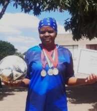 Sophia and her soccer awards!