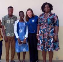 Akweley and Mawuli with IOM staff