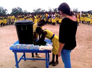 Students learn how to use the hand-washing station