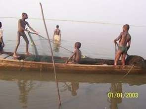 Trafficked children working on the lake