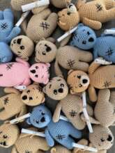 Available in beige, blue, and pink