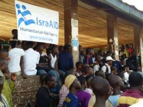 Community Members Watching the Freetong Players