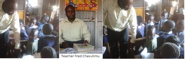 Teacher Fred with children in Class
