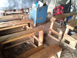 The classroom floor is badly damaged