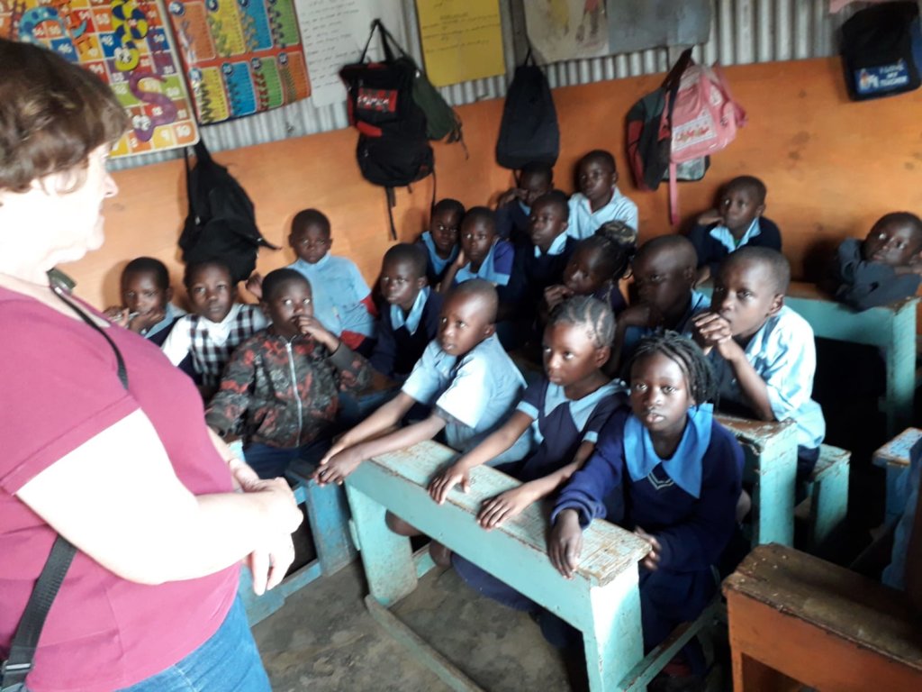 Andria talking to the children at Abundance School