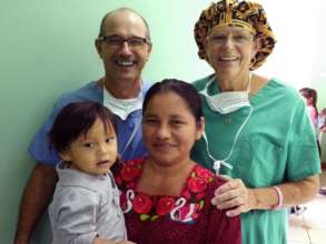 Kennet and his Mother with Surgical Team Members
