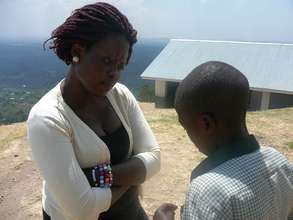 The Project Officer talking to one of the girls