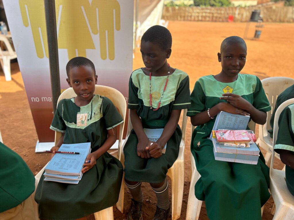 students with some materials distributed.