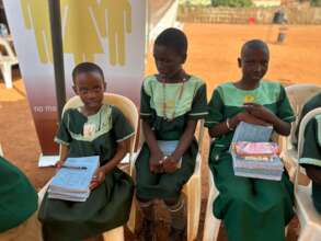 students with some materials distributed.