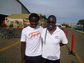 Hassan Ndayashimiye with coach Dr. Liz Odera
