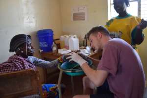 Dr. Oliver assisting CHAT with service provision