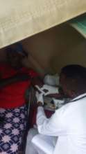 Nyangweso receiving FP services from a locum nurse