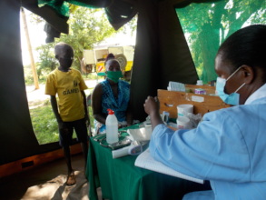 A child receiving treatment from CHAT Nurse