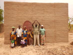 A family in front of their NV house
